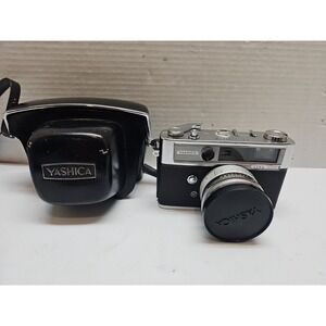 Yashica Lynx 5000 35mm Rangefinder Film Camera. 45mm f/1.8 Lens. W/ Casing